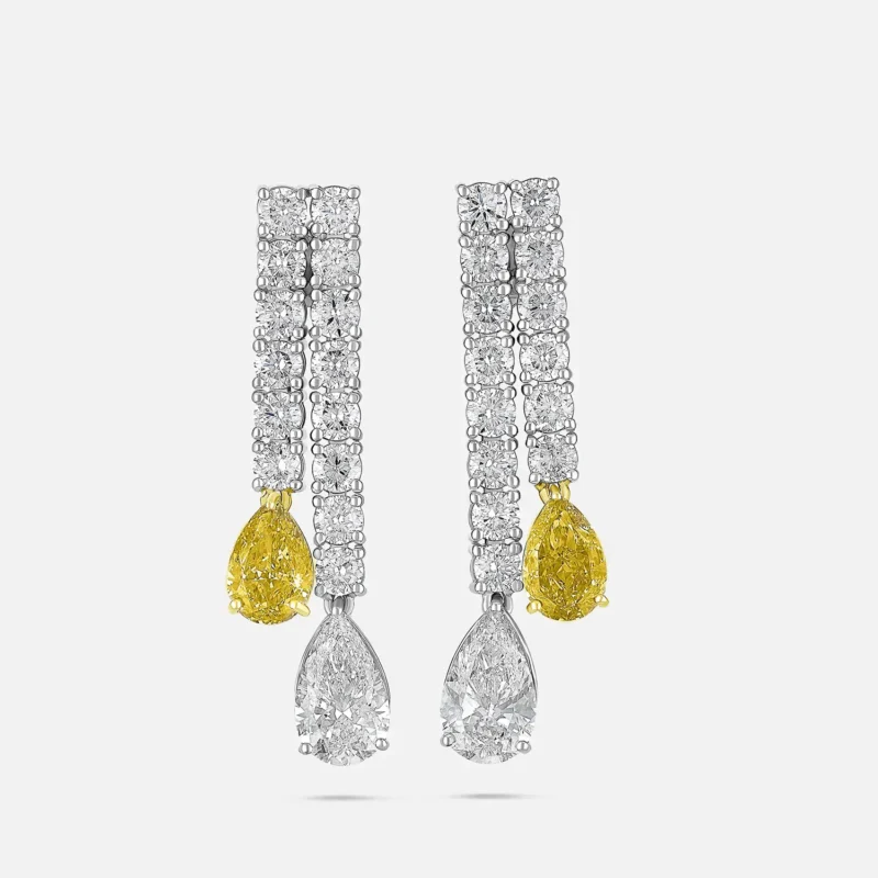 The New Leo. The new diamond 7 Orecchini con diamanti degradè e goccie fancy yellow e bianche